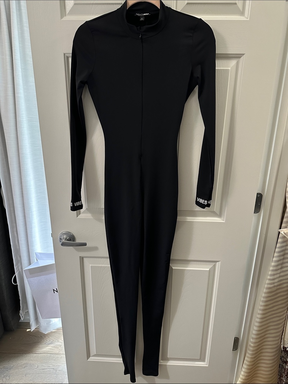 Fashion Nova Black Long-Sleeve Zip Front Unitard